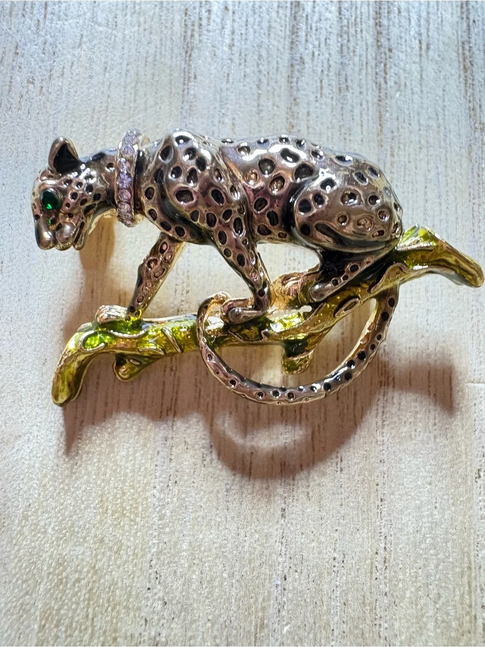 Gold-Tone Leopard Brooch with Green Accent on Branch